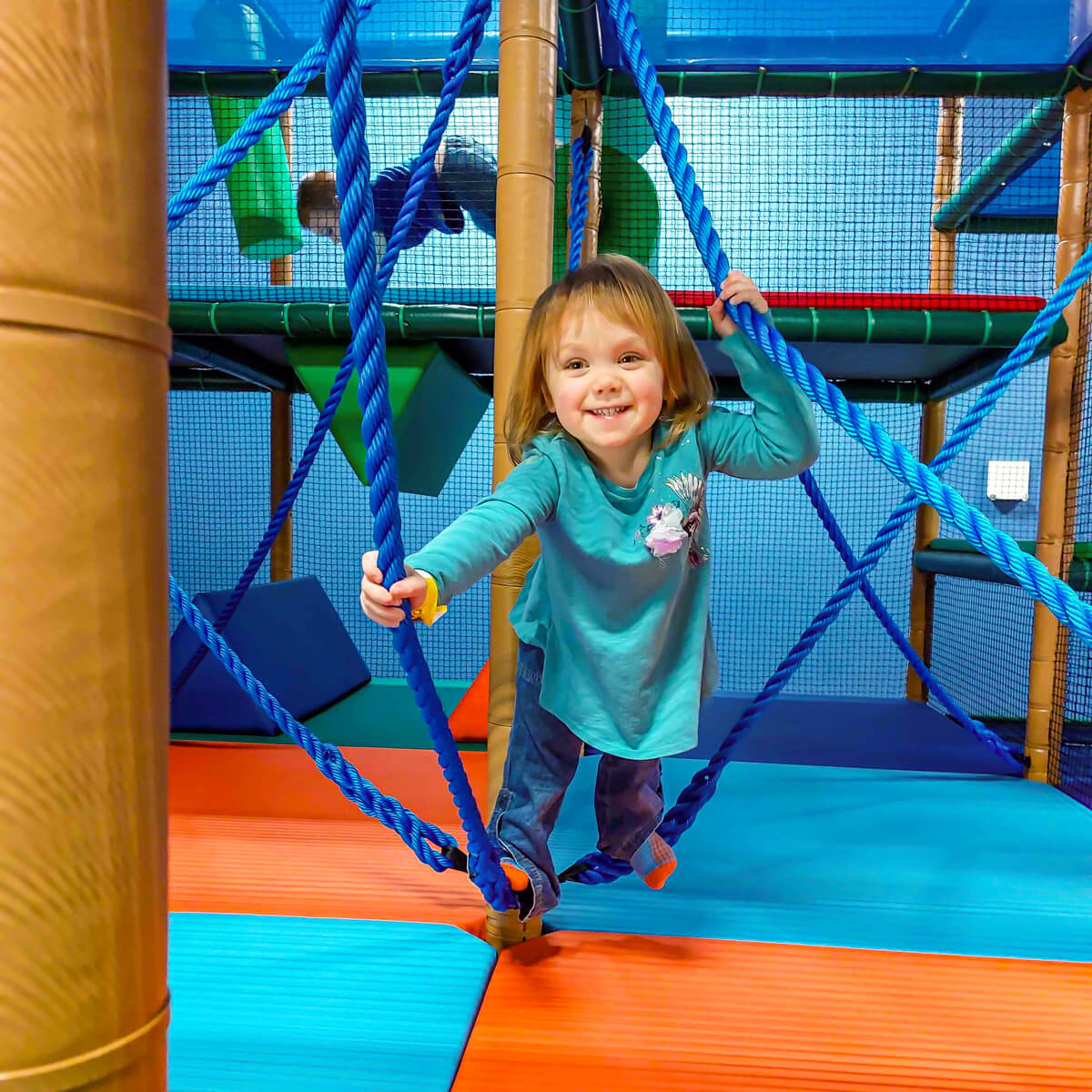 Kid playing in Mansfield Texas indoor playground